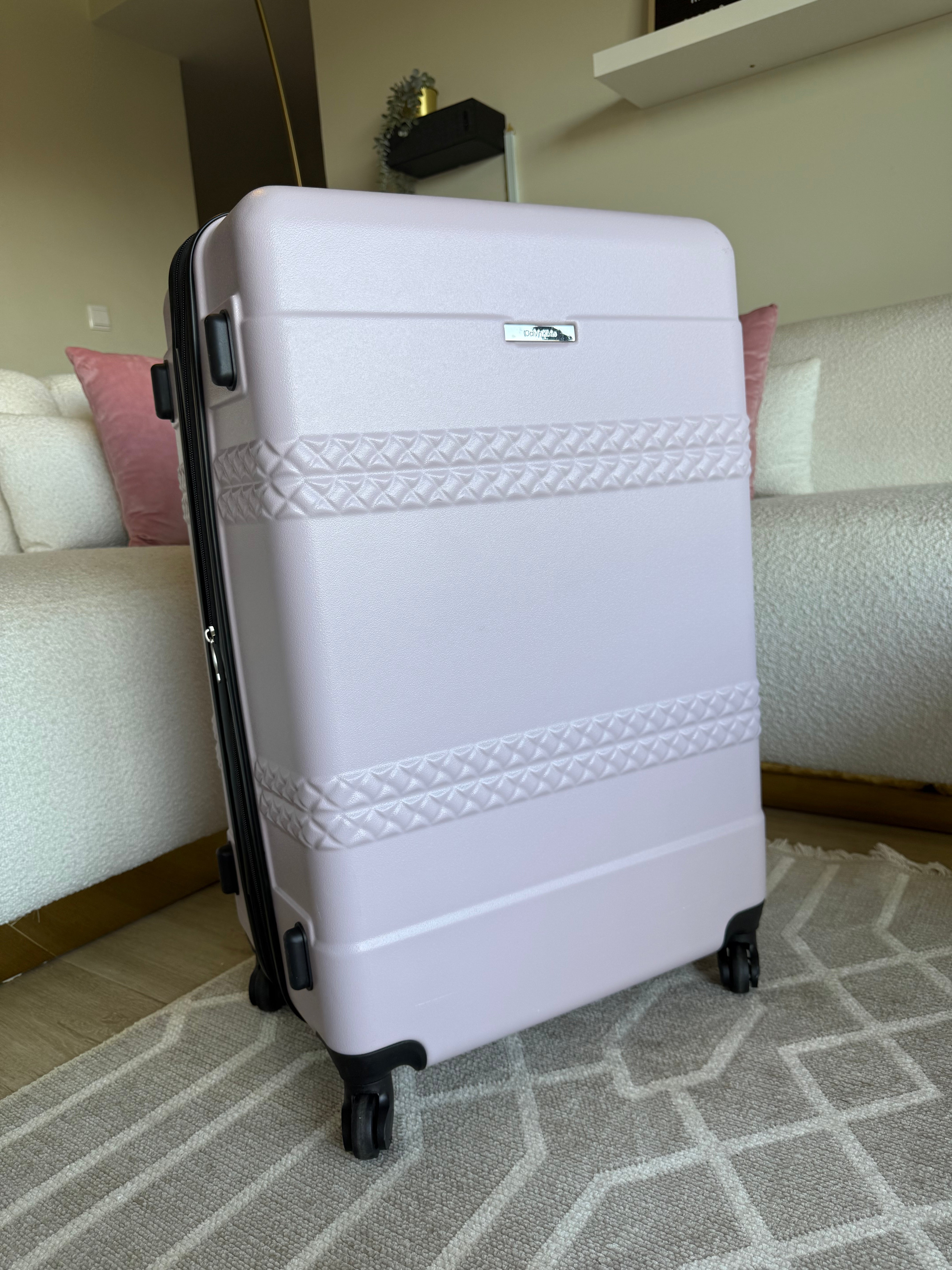 Calvin Klein Checked Suitcase Landing Hard