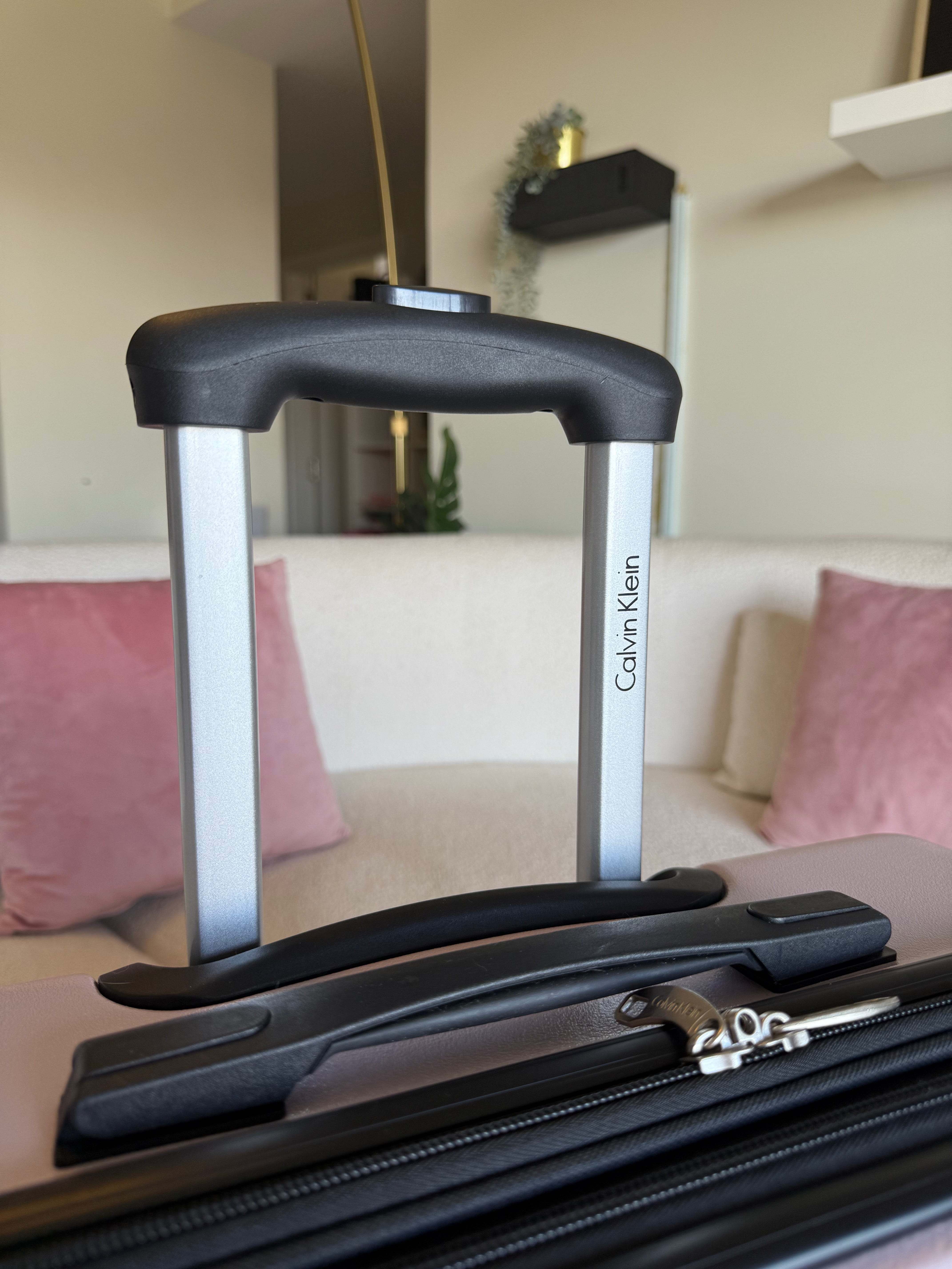 Calvin Klein Checked Suitcase Landing Hard