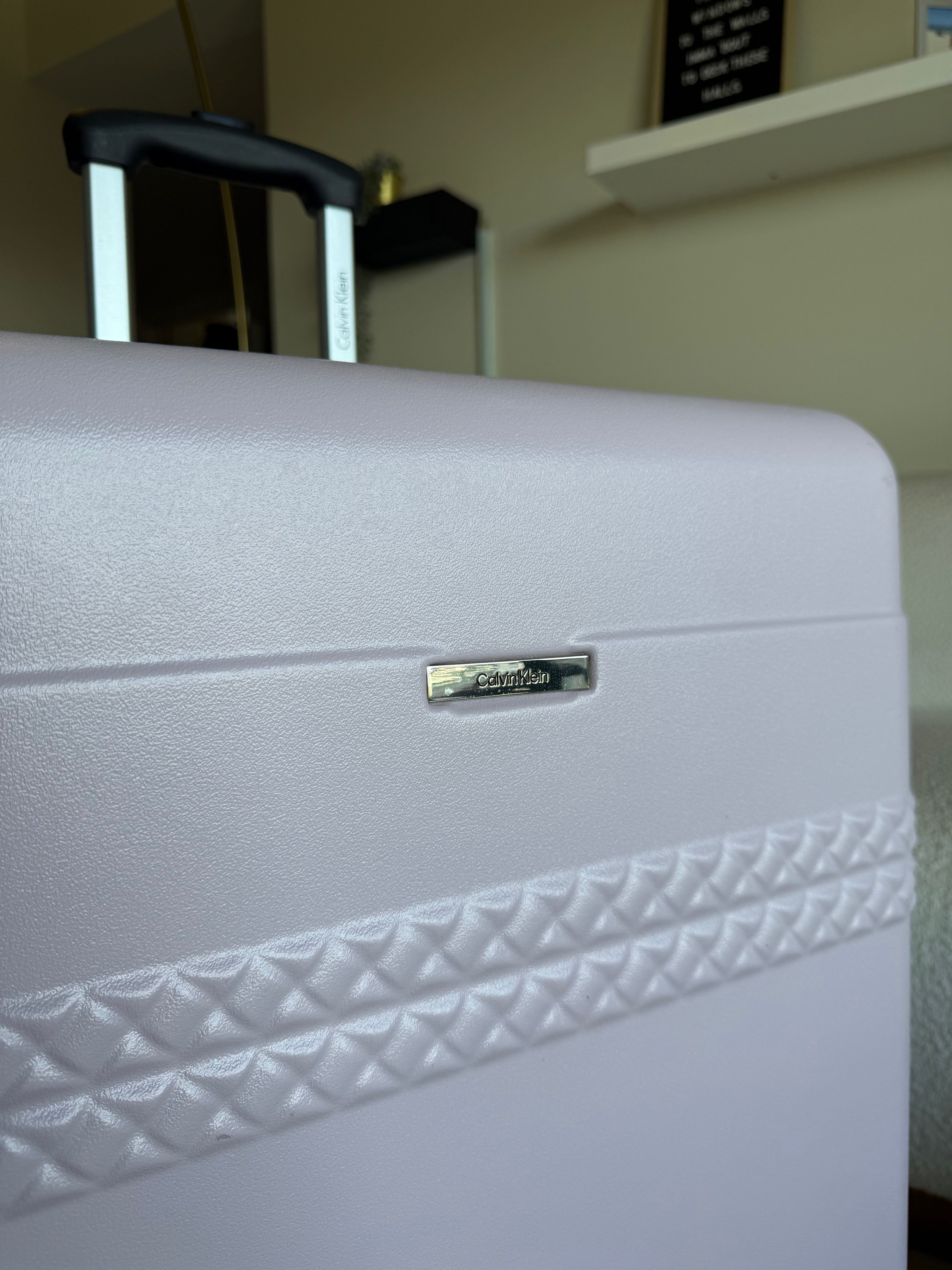 Calvin Klein Checked Suitcase Landing Hard