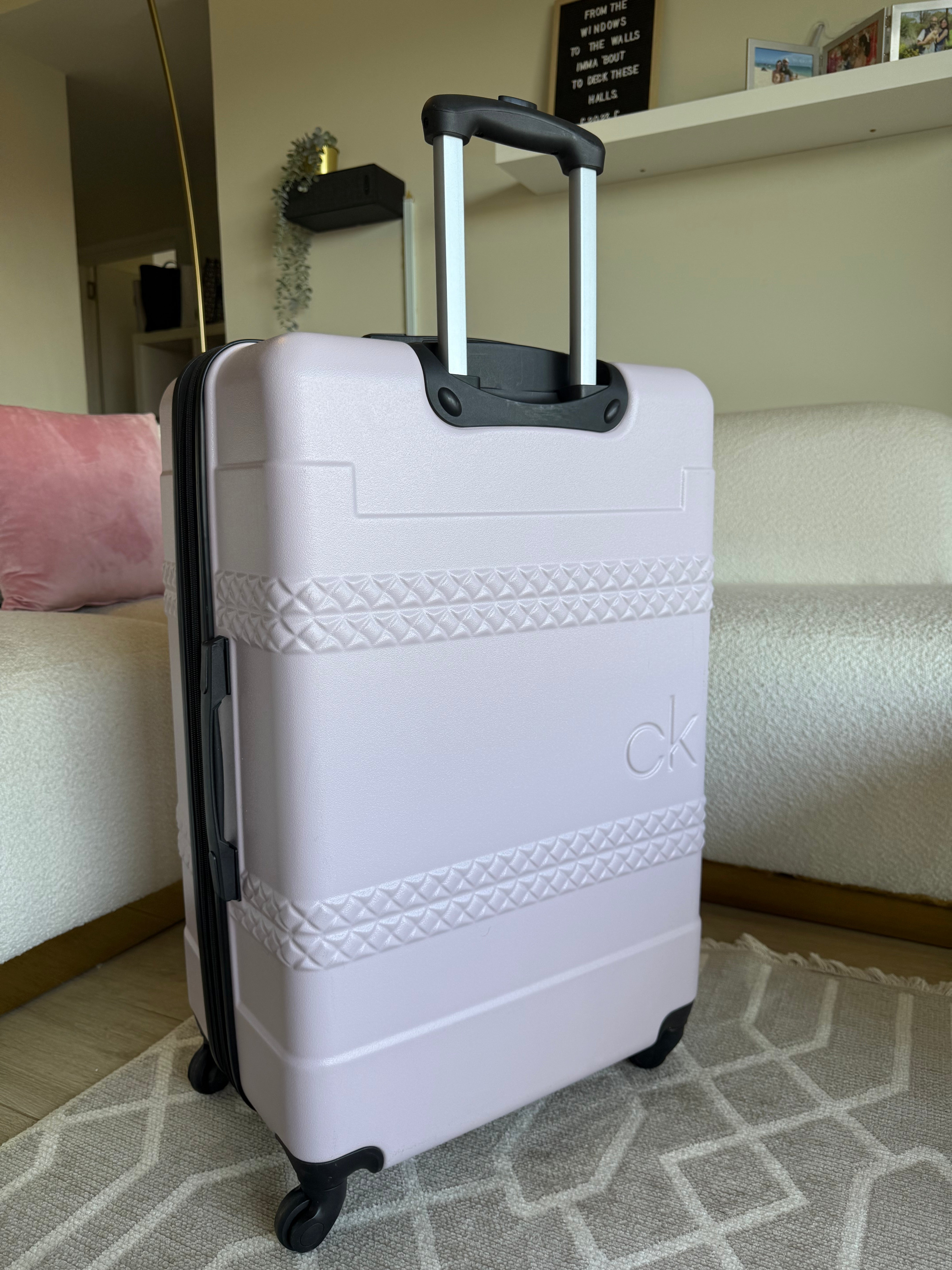 Calvin Klein Checked Suitcase Landing Hard